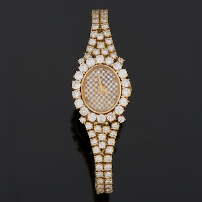 A Ladies' Omega 18k Gold and