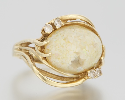 A Ladies' Opal Bits Cabochon Ring