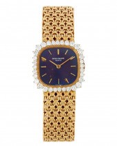 A LADIES PATEK PHILIPPE GOLD W