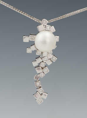 A Ladies' Pearl and Diamond Pendant