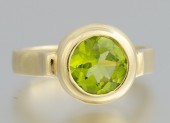 A Ladies' Peridot Ring Signed