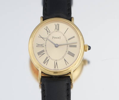 A Ladies' Piaget 18k Gold Wrist
