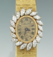 A Ladies' Piaget 18k Gold and