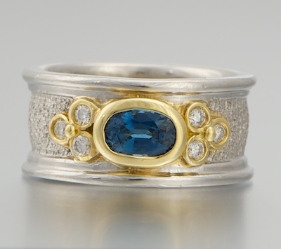 A Ladies' Platinum 18k Gold