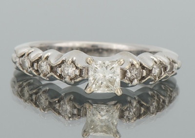 A Ladies' Princess Cut Diamond Ring