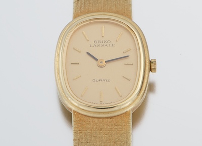 A Ladies' Seiko Lassale 14k Gold