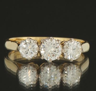 A Ladies' Three Diamond Ring 14k