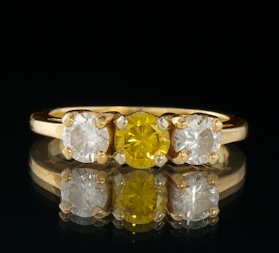A Ladies' Three Diamond Ring 14k