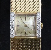 A lady's 18ct gold and diamond