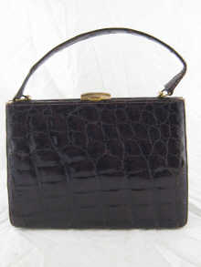 A lady's dark crocodile skin