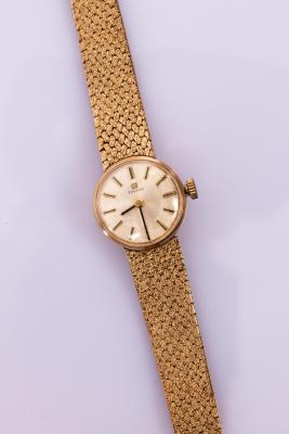 A lady's gold cased Tissot