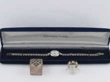 A lady's white metal (tests silver)