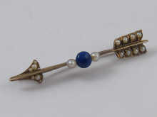 A lapis lazuli and yellow metal