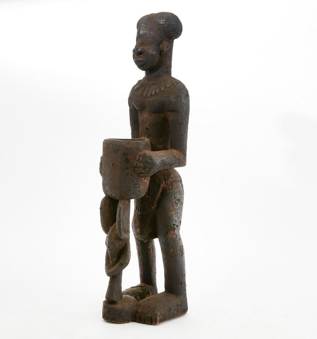 A LARGE AFRICAN WOOD FIGURE,