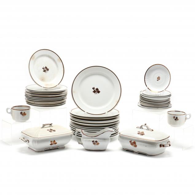 A LARGE ANTIQUE SERVICE OF TEA LEAF