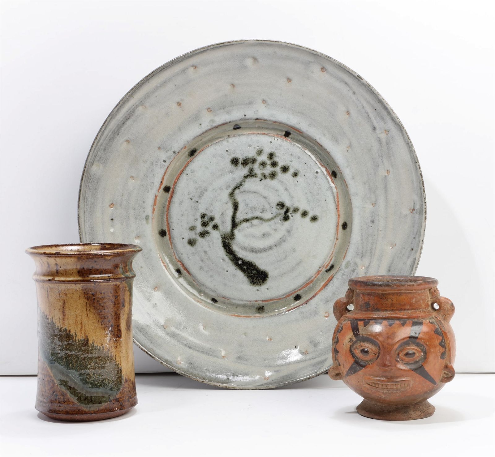 A LARGE ASIAN CERAMIC CHARGERA