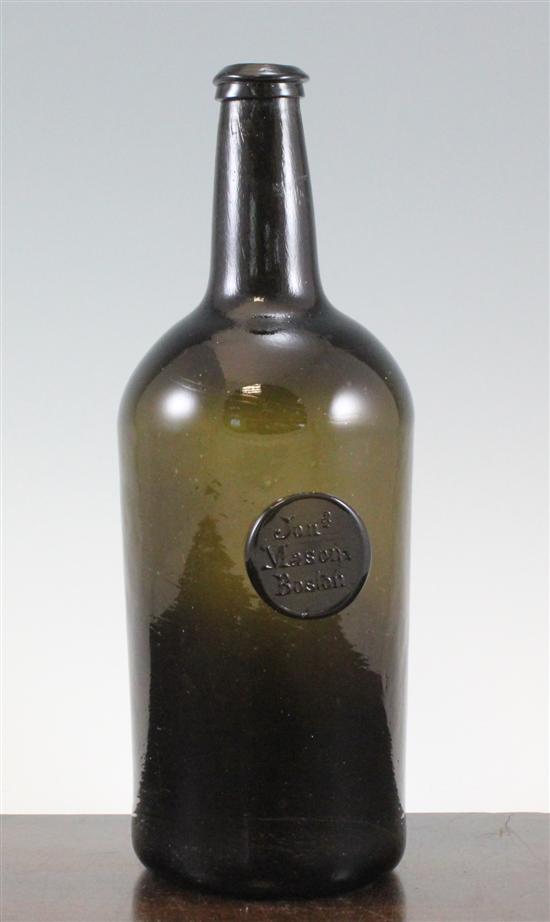 A large black glass sealed wine