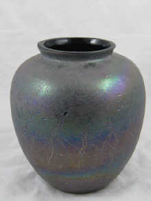 A large black glass vase with