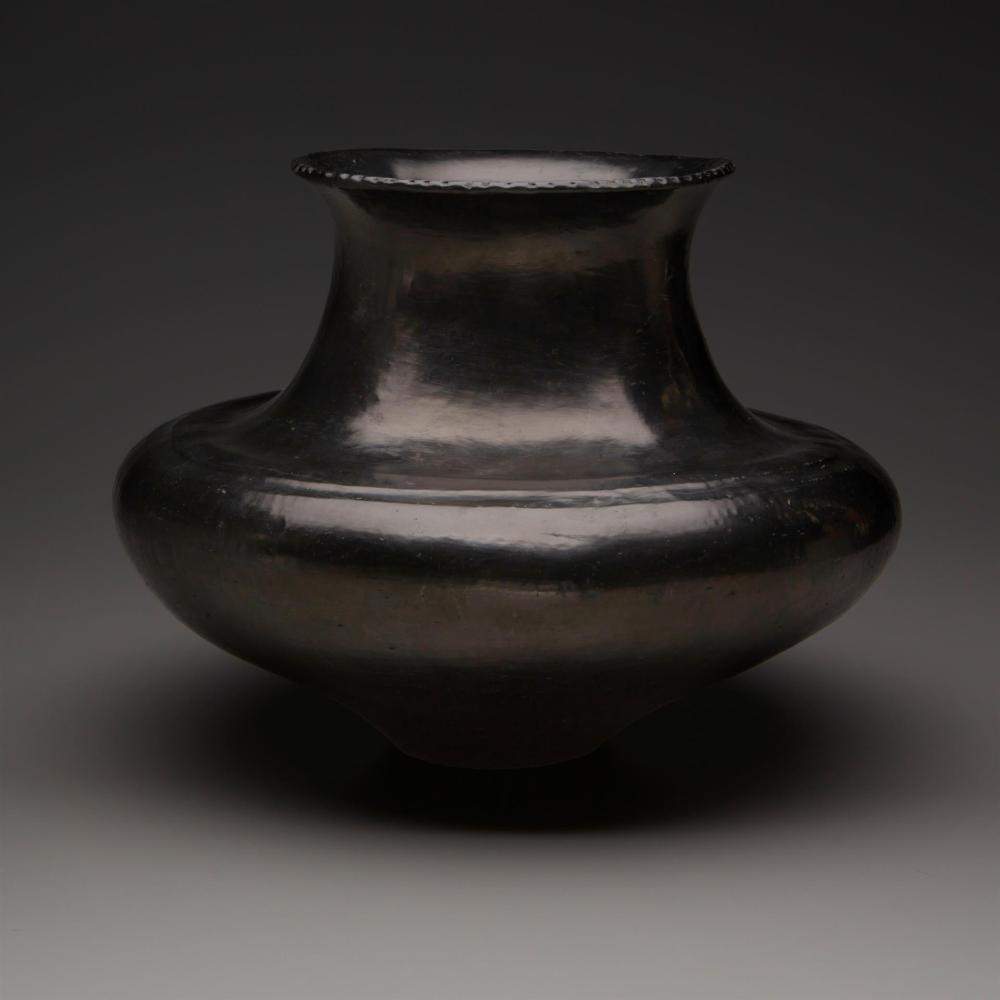 A LARGE BLACKWARE SANTA CLARA