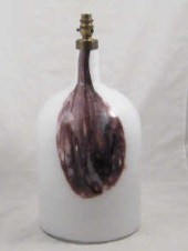 A large bottle shaped glass la