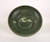 A LARGE BRETBY EARTHENWARE SHA
