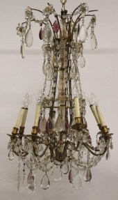A LARGE BRONZE 8 LIGHT CHANDEL