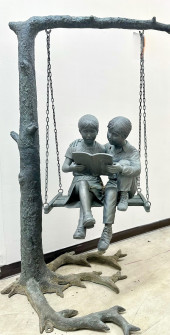 A LARGE BRONZE FIGURAL SCULPTU
