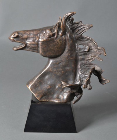 A Large Bronze Figure of a Stylized