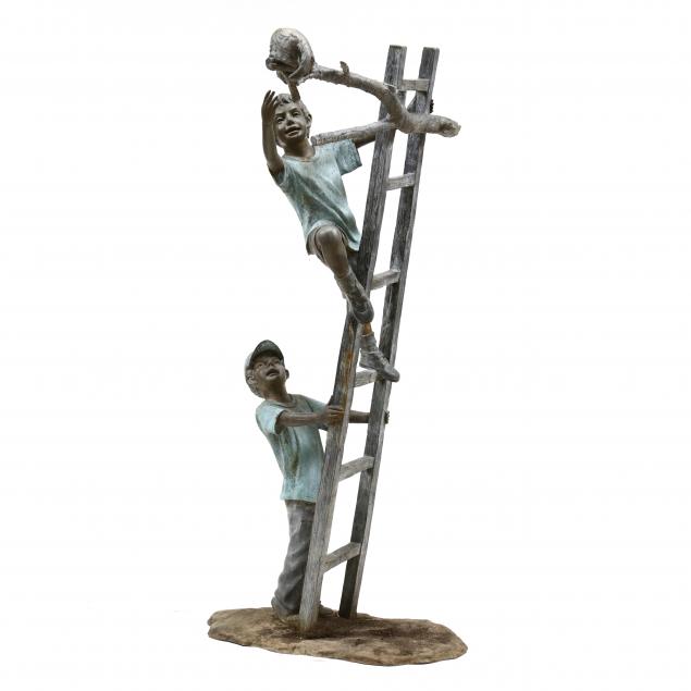 A LARGE BRONZE GARDEN STATUE OF TWO
