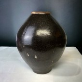 A LARGE BROWN GLAZED CHINESE M