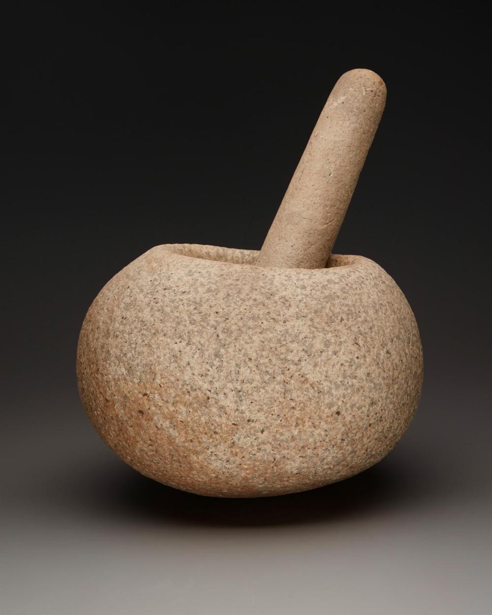 A LARGE CALIFORNIA GRANITE MORTAR