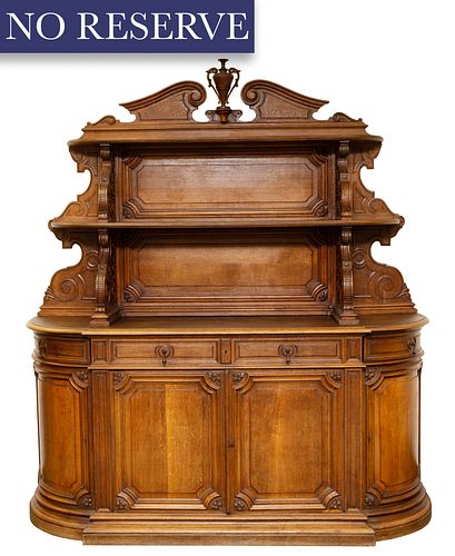 A LARGE CARVED AND STAINED WOODEN