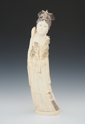 A Large Carved Ivory Quan Yin