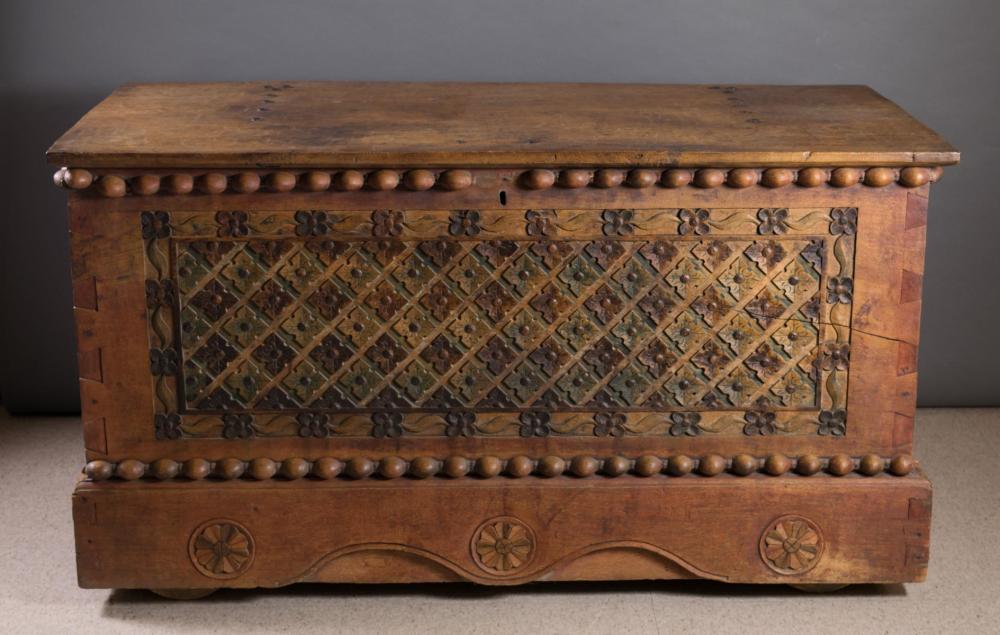 A LARGE CARVED MERANTI WOOD DOWRY