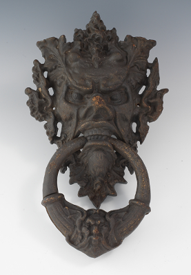 A Large Cast Iron Door Knocker