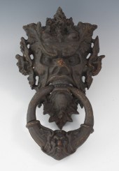 A Large Cast Iron Door Knocker