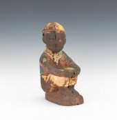 A Large Cast Iron Seated Jocke