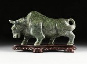 A LARGE CHINESE CARVED DARK GR