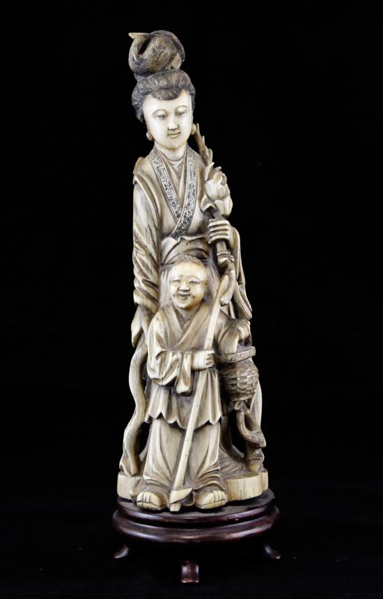 A large Chinese ivory group of a
