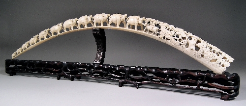 A large Chinese ivory tusk carved