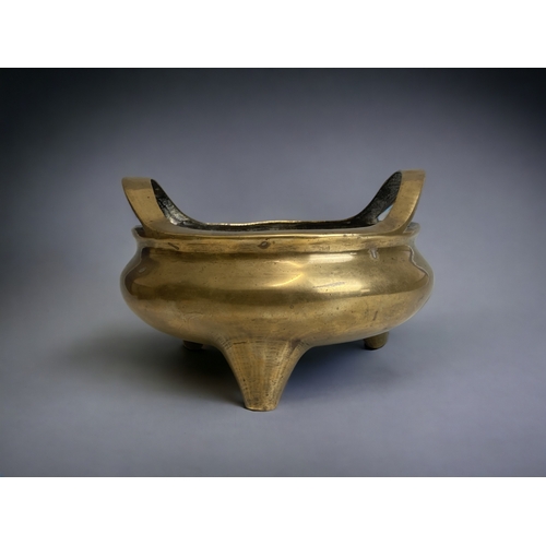 A large Chinese polished bronze