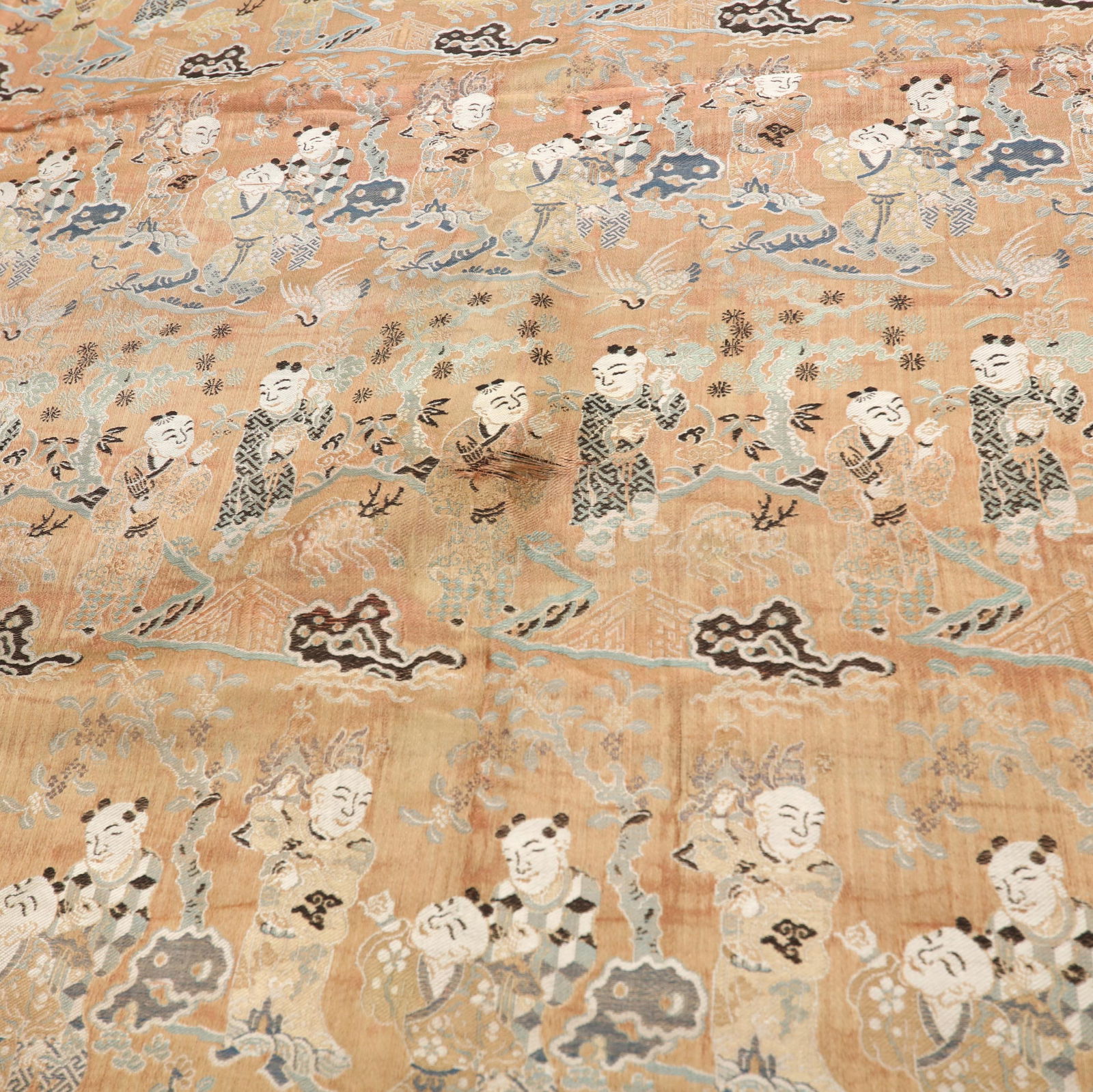A LARGE CHINESE WOVEN TEXTILE