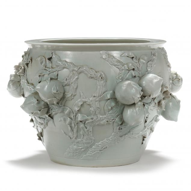 A LARGE CHINOISERIE CELADON