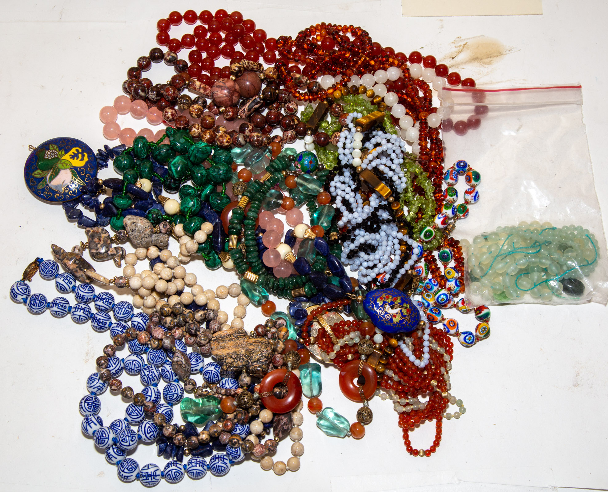 A LARGE COLLECTION OF BEADED