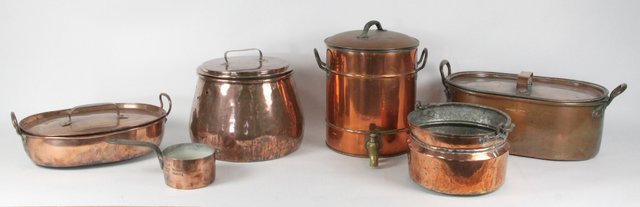 A large copper pan and cover of