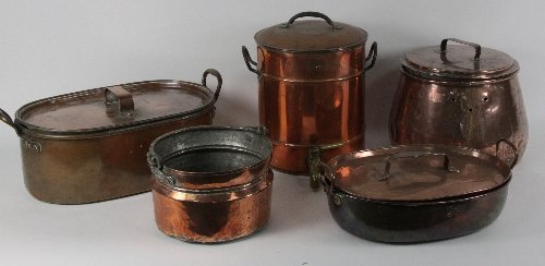 A large copper pan and cover of