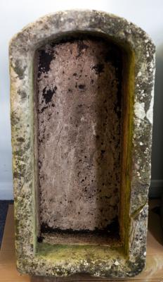A large D-shaped stone trough, 90cm