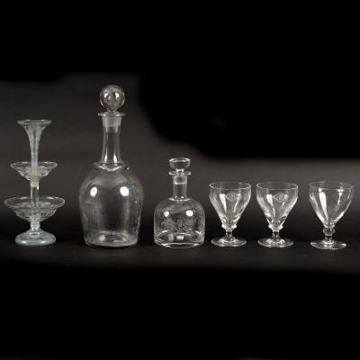 A large decanter and stopper,