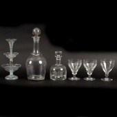 A large decanter and stopper,