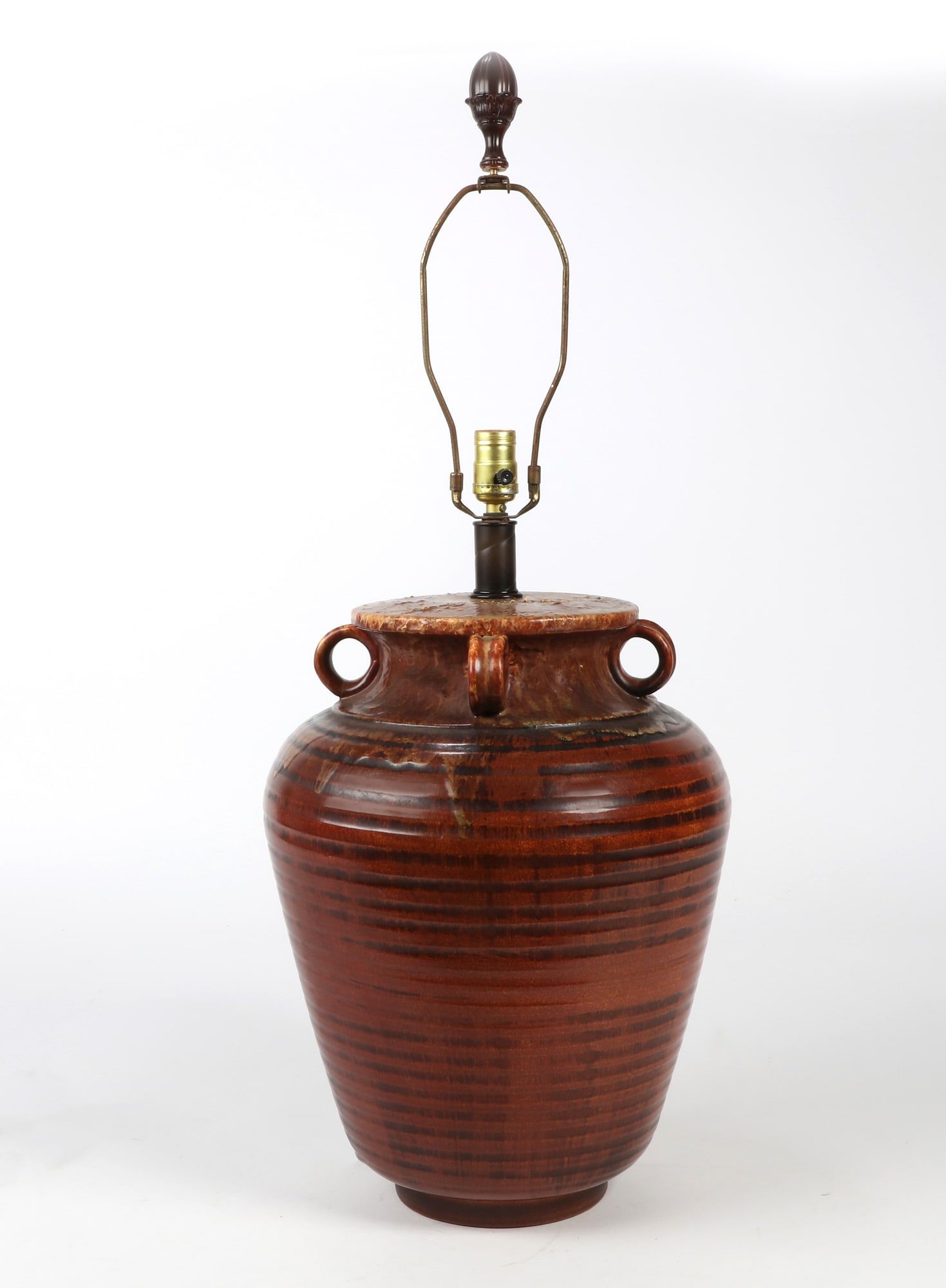 A LARGE EARTHENWARE GLAZED LAMPA